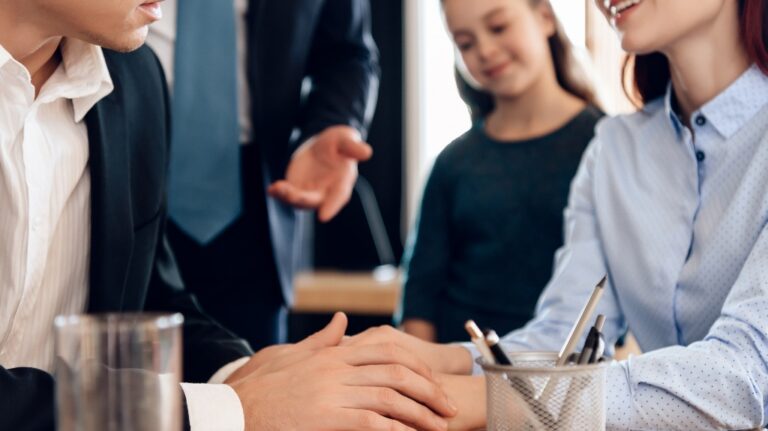 Family couple with daughter at lawyer's office