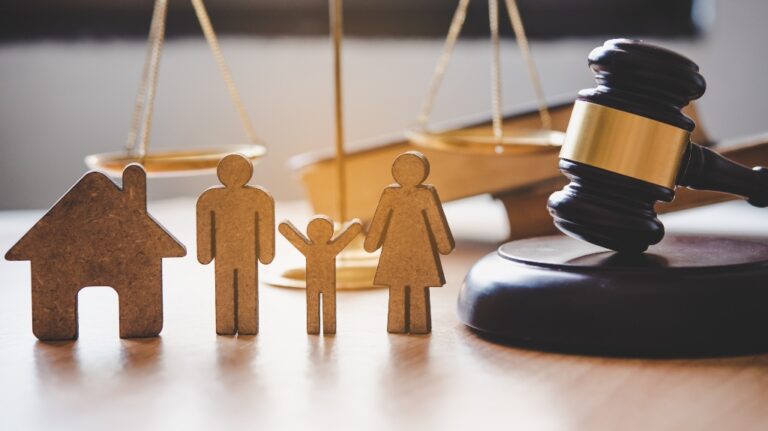 Family figures and judge's gavel