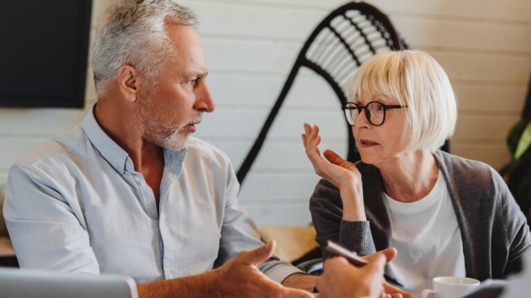 Senior couple is consulting with lawyer about divorce