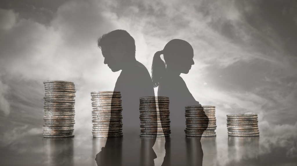 figures of a couple standing back to back against a background of coins