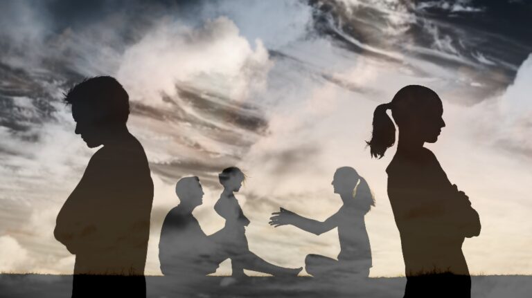 silhouette of separated parents and children